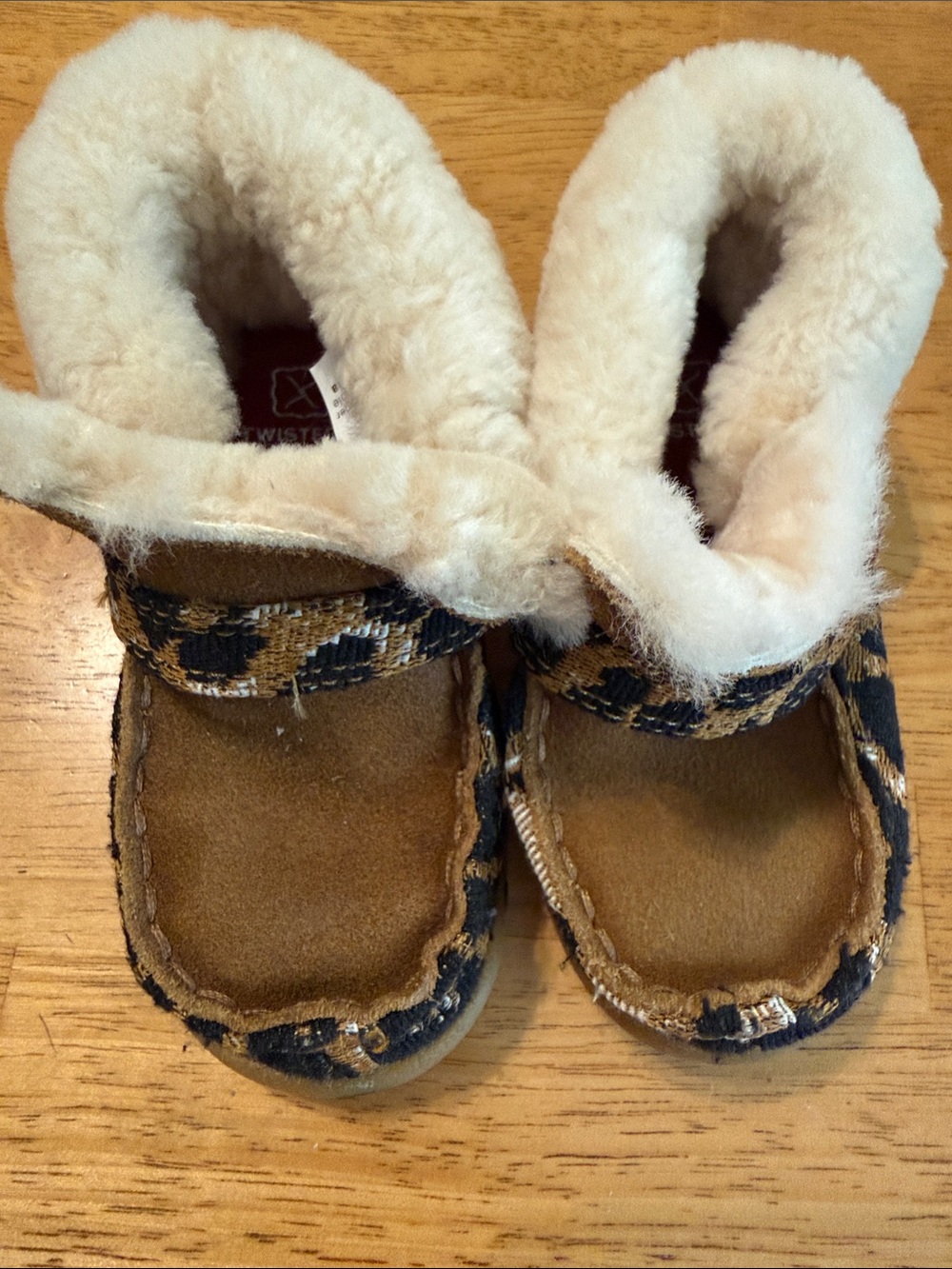Twisted X Kids Moccasin-Style Slippers in Tan and Cream with Black Trim